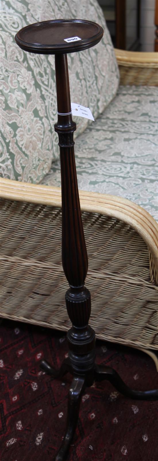 A late 18th century mahogany reeded slender baluster tripod torchere, H.112cm